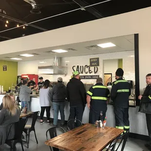 a group of people in a restaurant