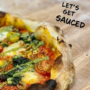 a pizza on a cutting board