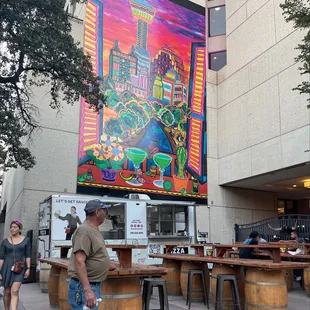 a colorful mural on the side of a building