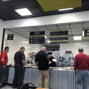 a group of people in a restaurant