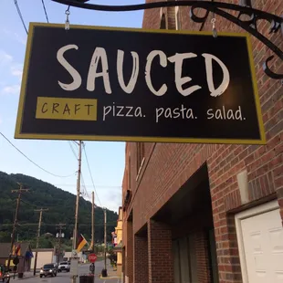 a sign on the side of a building
