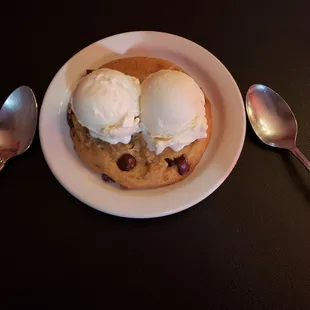 Baked cookie and vanilla iced cream. YUM