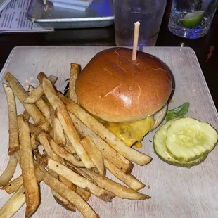 Greasy cheeseburger and undercooked fries.