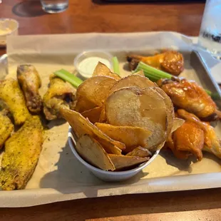 5 lemon pepper wings, homemade chips, and 5 mild buffalo wings $18.00.