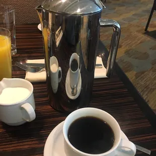 Coffee is a pot. Nice touch