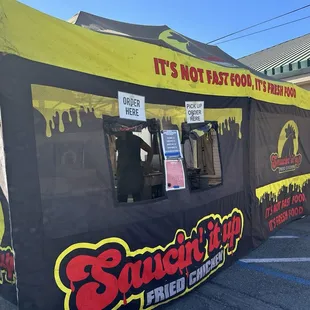 Saucin' it up Fried Chicken tent at Brethren Brewing Company in Manteca. September 2024.