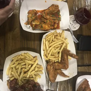 Moksa beer with some Saucy Lito&apos;s wings and fries.