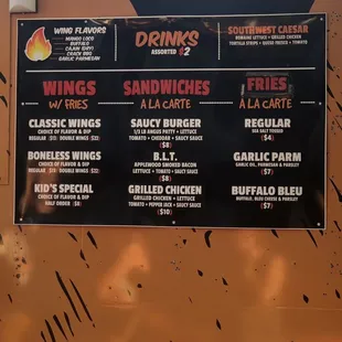a menu on a food truck