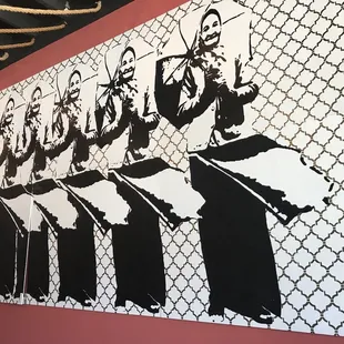 a group of women in black and white