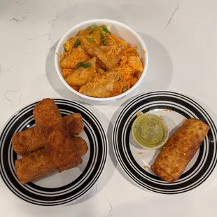 Puerto Rico rice with penang curry tofu, chorizo egg rolls, and veggie egg roll