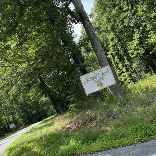 a sign for saude creek winery