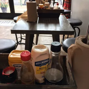 a table full of condiments