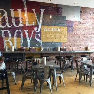 a restaurant with tables and chairs