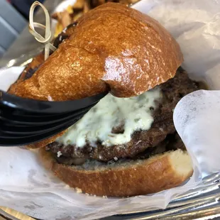 a hamburger with a fork in it