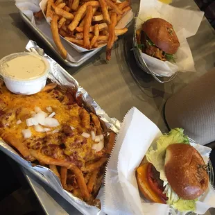Rocket burger in back with large fries, Sauly burger up front with chili cheese fries.