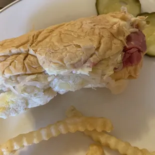 Corned beef sandwich with sauerkraut AND MUSH WET BREAD.