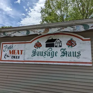 a sign on the side of a building