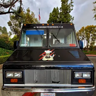 the logo on the side of the truck