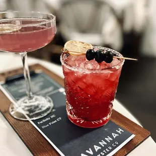 two cocktails on a table
