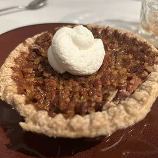 Pecan Pie $12.  The most disappointing of our dishes tonight, the pie was cold and the crust was thick and rather tasteless.