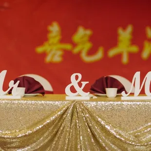 Gold glitter Sweetheart table cloth - Photo taken by Isle Media