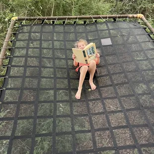 Reading amongst the trees!