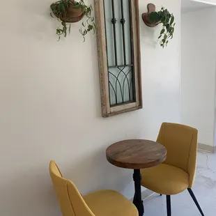 a table and two chairs