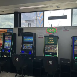 a row of slot machines in a store
