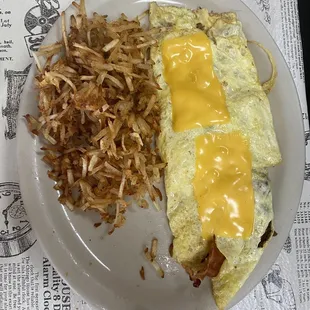 All meat omelet and crispy hash browns