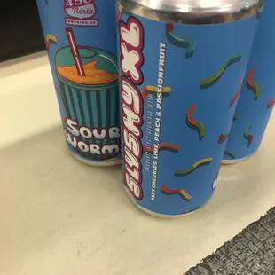 three cans of soda