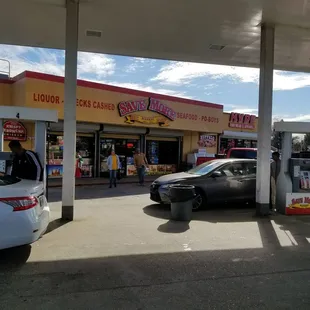 cars parked at a gas station
