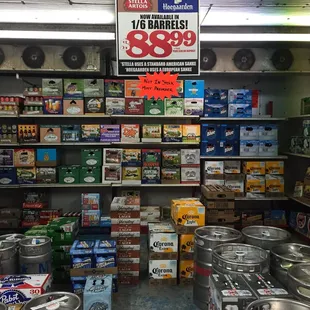 a variety of kegs in a store