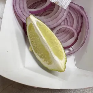 Onions and lime on the side