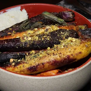 The Roasted Baby Carrots were topped with mint &amp; pistachio then served alongside lemon ricotta.