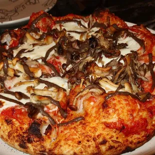 The Funghi Sourdough Pizza was made with black trumpets, hen of the woods, &amp; black truffle puree.