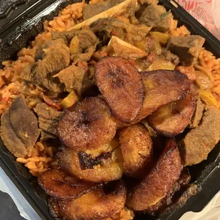 Jollof Rice, Curry Goat Meat, and Plantain