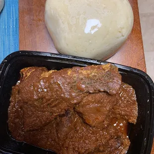 Tomato stew with assorted meats (fish, beef, cow skin)  And fufu