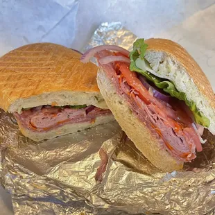 $12.99 | The Toscana - Genoa salami, prosciutini, capicolla, and provolone cheese w/ lettuce, tomato, red onion &amp; vinaigrette dressing.