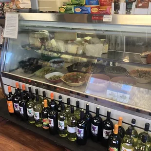 a display of olives and olive oil