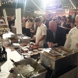 SAVOR DALLAS 2015 : At Fair Park Centennial Hall. Chefs at work behind their food stations.