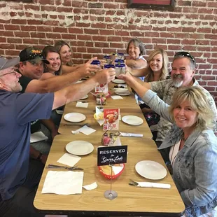 "Salud!" right before our freshly made guacamole and margaritas.