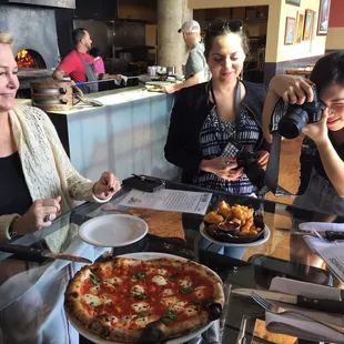 Travel bloggers at work.