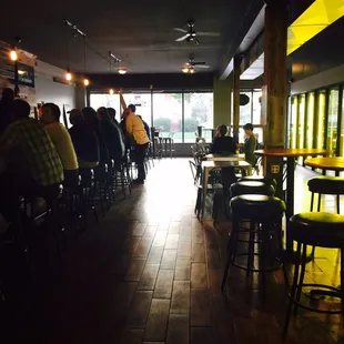 The inside. Grab a drink at the bar or grab yours to-go.