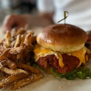 a burger and fries on a plate
