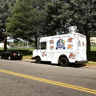 a food truck parked on the side of the road