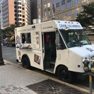 a food truck parked on the side of the road