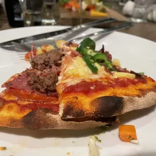 Meat lovers and jalapeño pizza