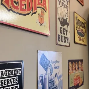 a wall full of signs