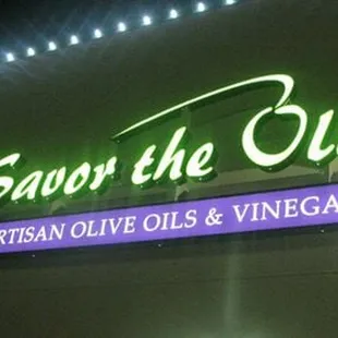 a neon sign for a restaurant