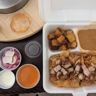 Chilaquiles come dry with the salsa/crema to pour on top